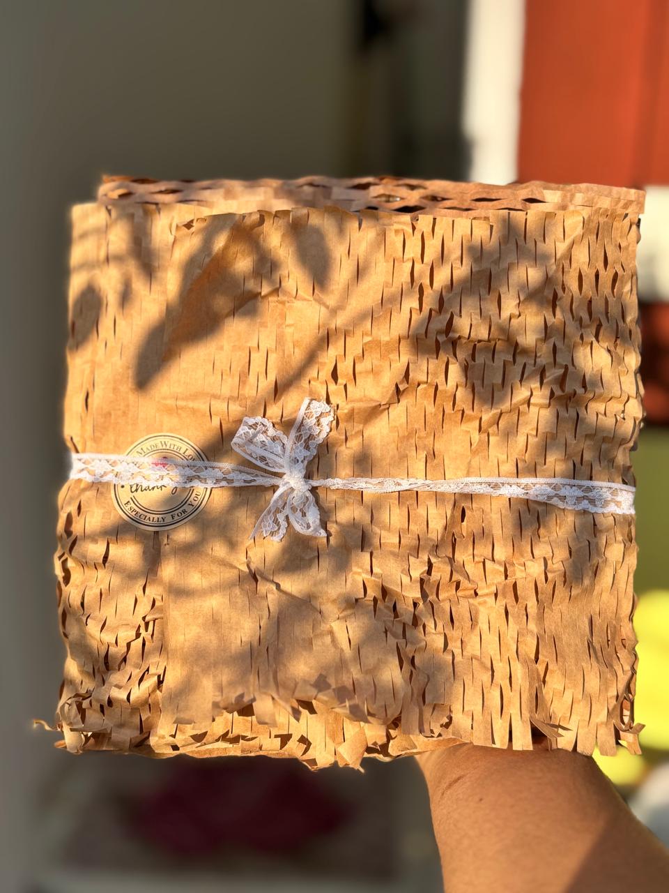 Eco-friendly kraft wrap tied with lace ribbon